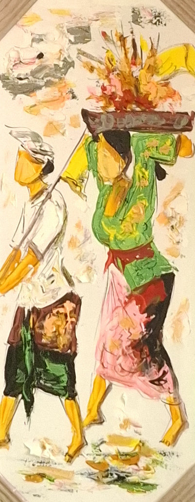 Colorful paper cutout of traditional figures on a white background