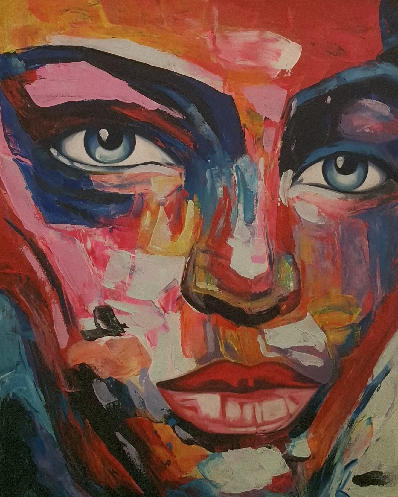 Colorful abstract painting of a face with intense expression