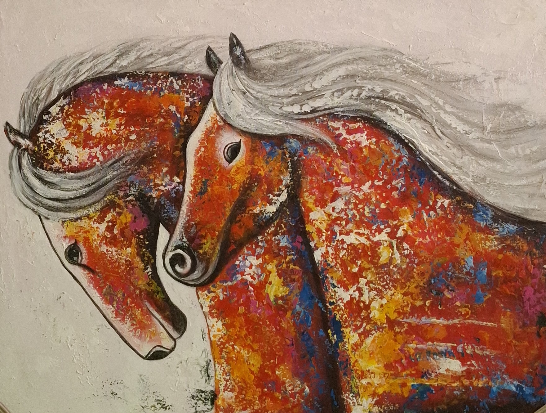 Colorful abstract painting of two horses on a textured surface