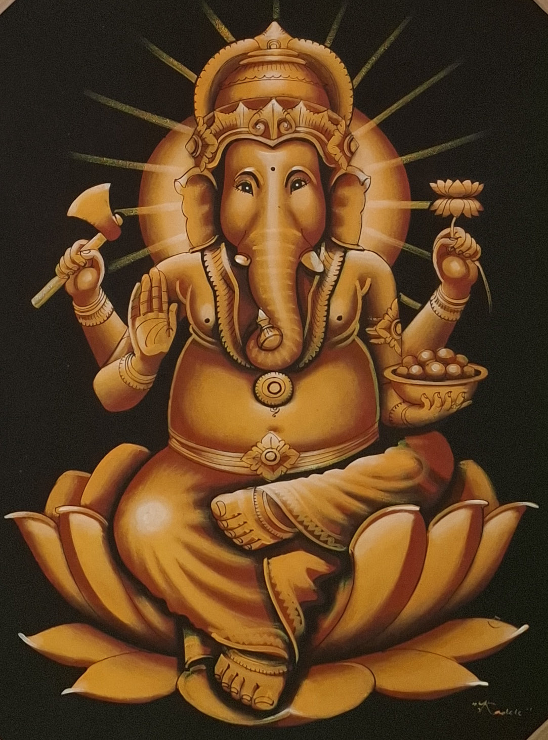 Gold-colored depiction of a deity sitting on a lotus flower against a dark background