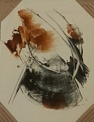 Abstract art piece with brown and black elements on a textured surface