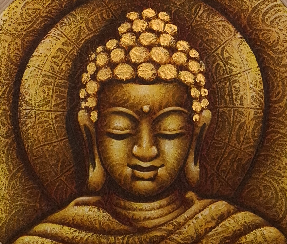 Carved stone statue of a Buddha with intricate patterns