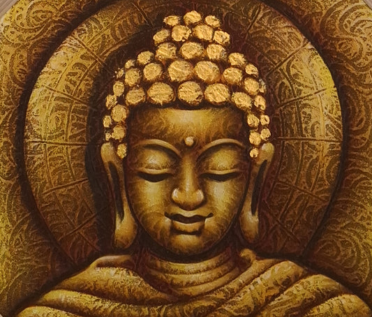 Carved stone statue of a Buddha with intricate patterns