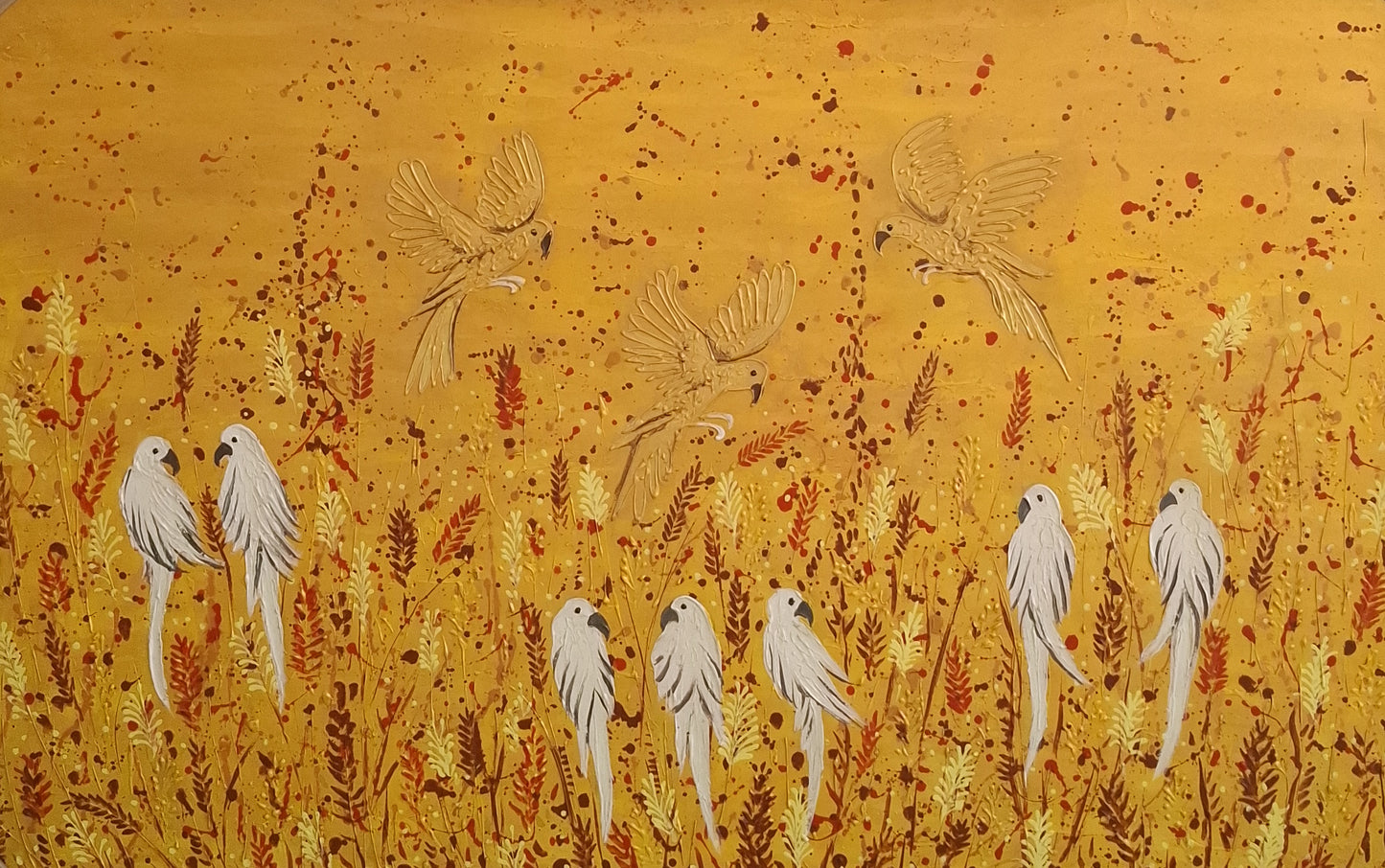 Artistic depiction of birds and flowers on a yellow background